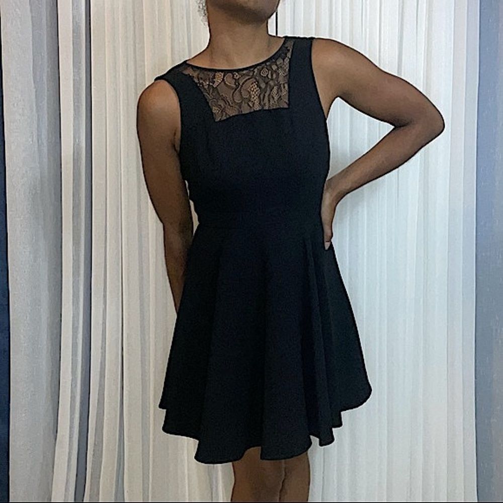 BCBGeneration Dress Womens Size 0 black sleeveless above knee flowy LBD